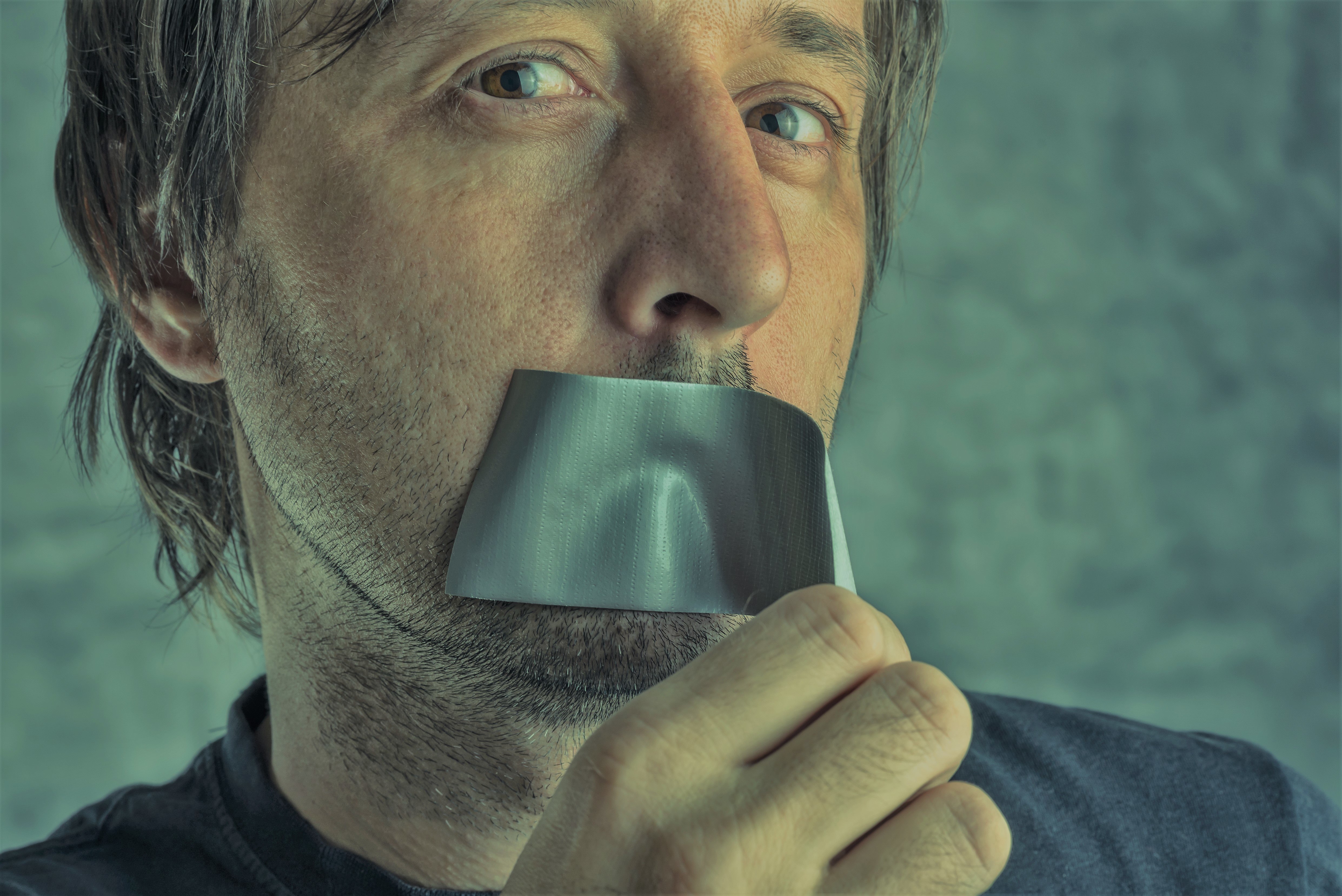 Fighting censorship, man removing duct tape from mouth advice from a wise old affiliate